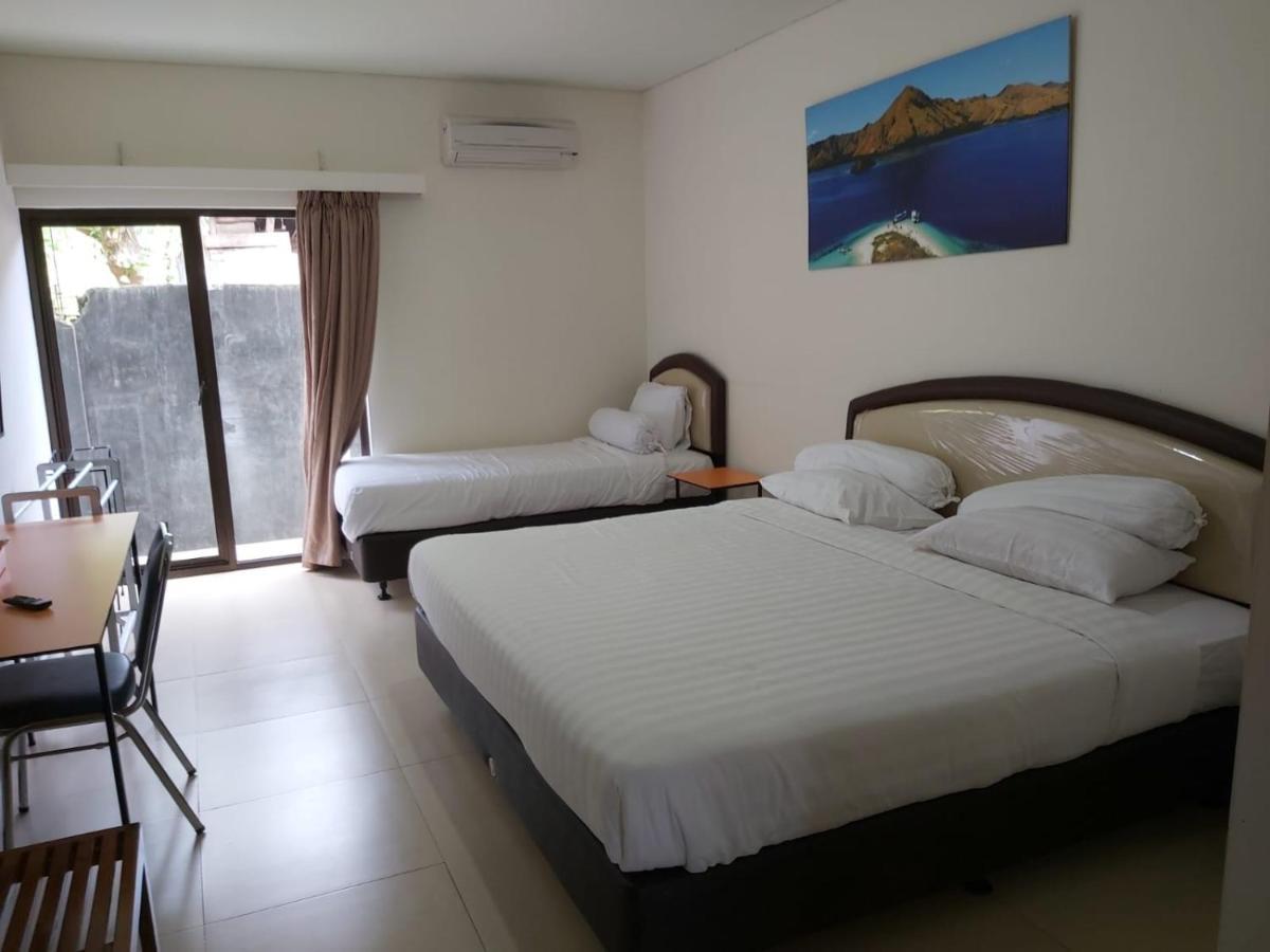 Hotel Larensia Лабуан-Бахо Экстерьер фото
