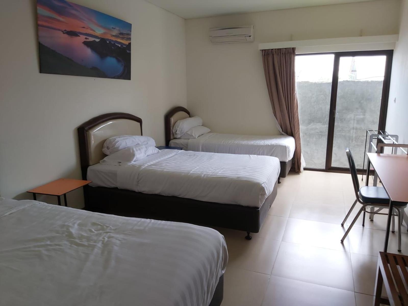 Hotel Larensia Лабуан-Бахо Номер фото